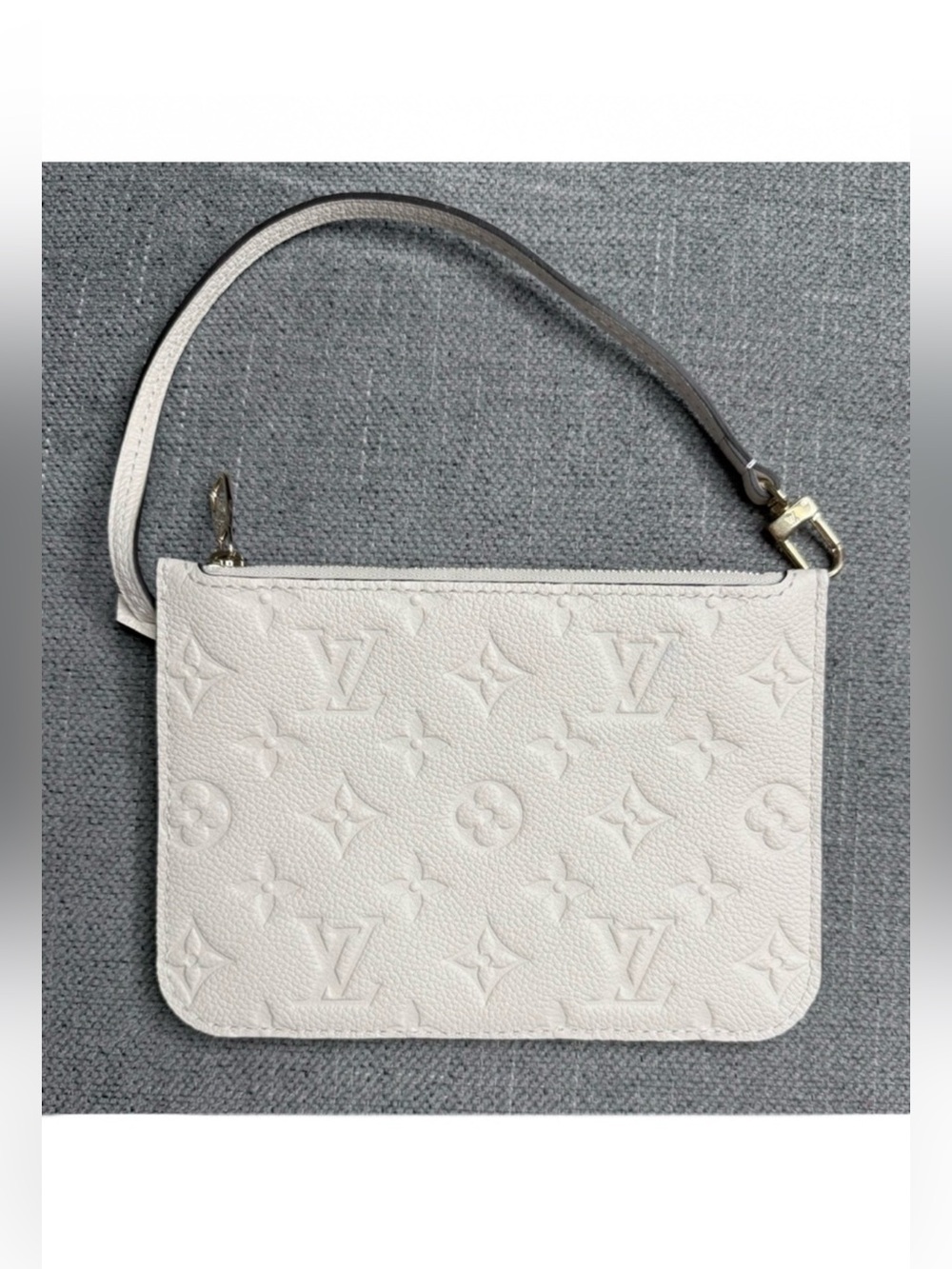 Louis Vuitton Loop monogram empreinte Cream wristlet pouch